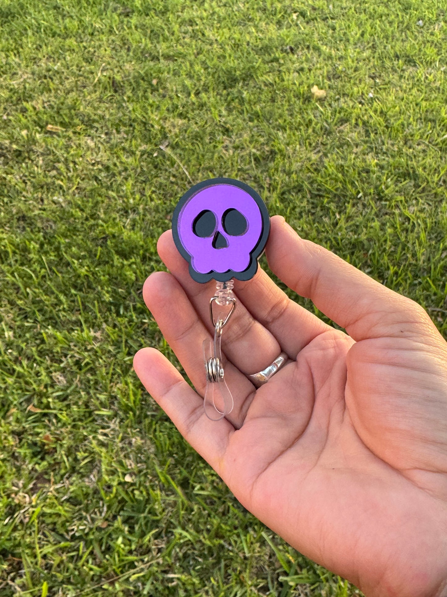 Mirrored badge reel