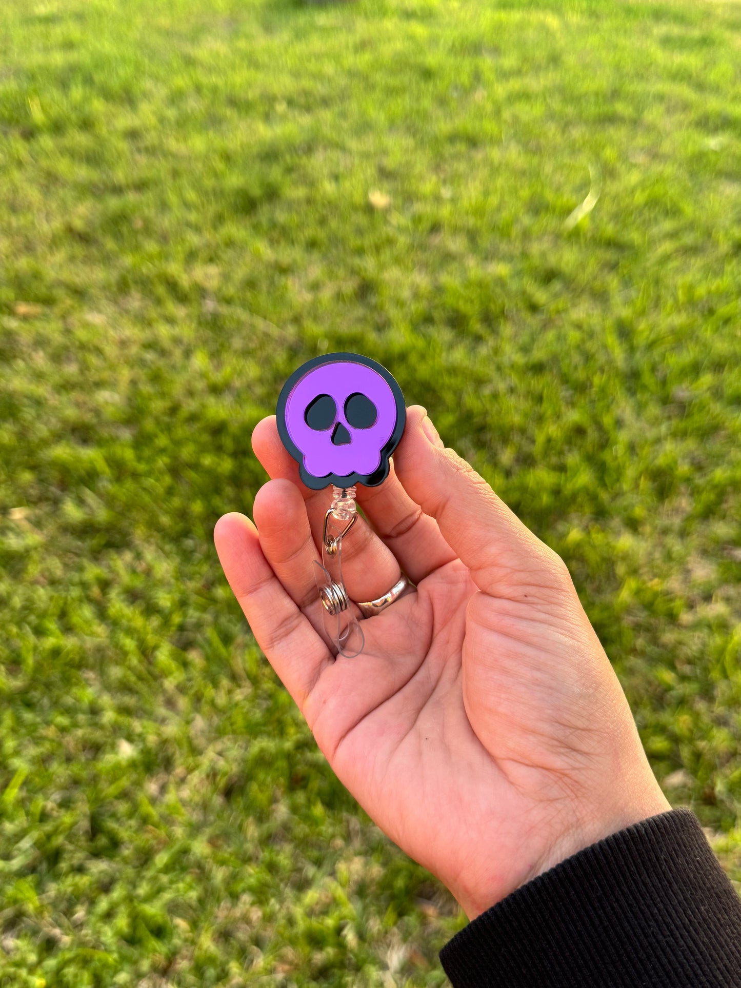 Mirrored badge reel