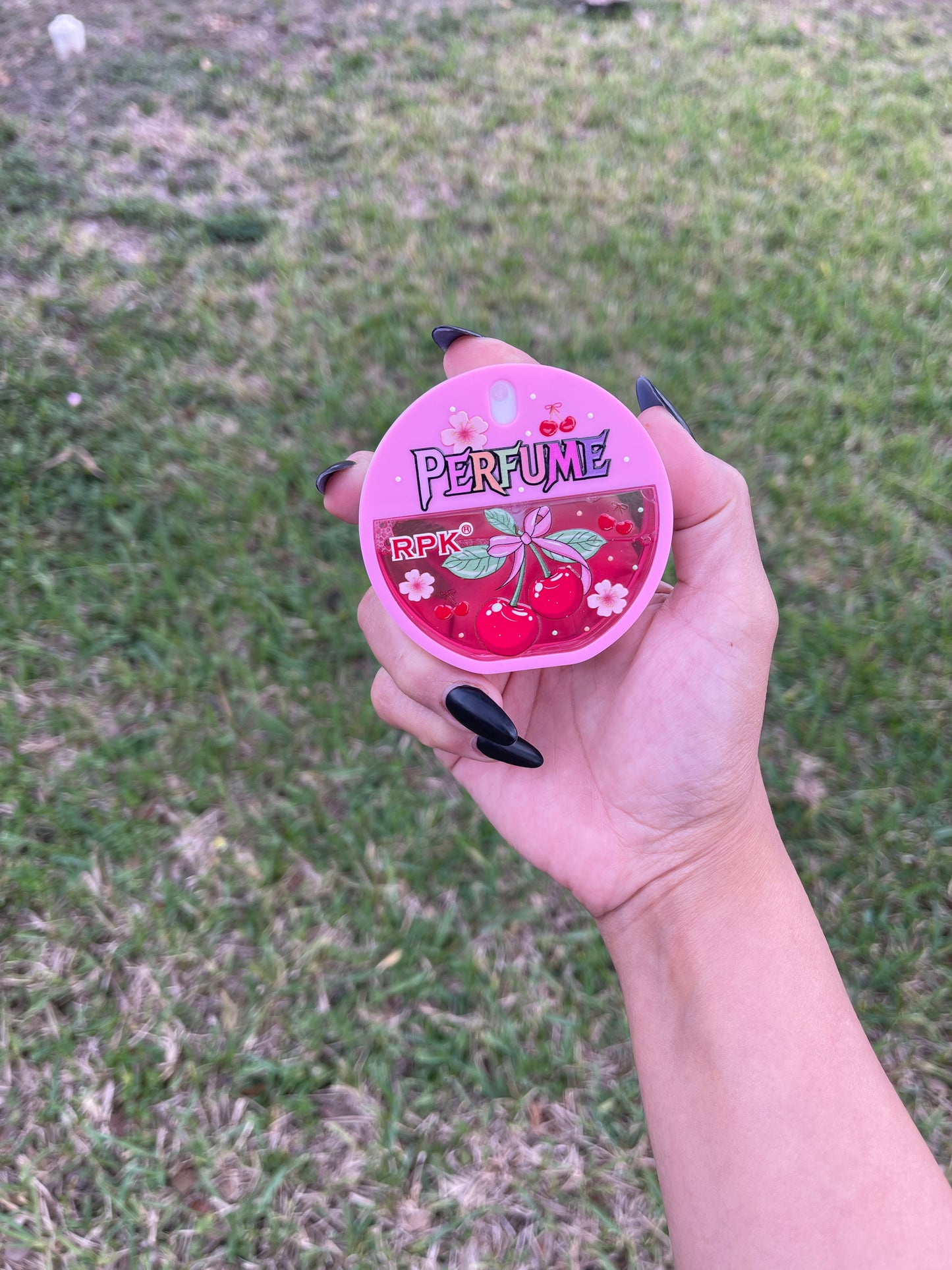 Cherry round perfume spray
